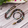 Collar Japa Mala de 108 cuentas de 8mm de Onyx Negro y Turquesa Africana para Meditación, Yoga y Oración. Japamala con Colgante de Ojo de Tigre